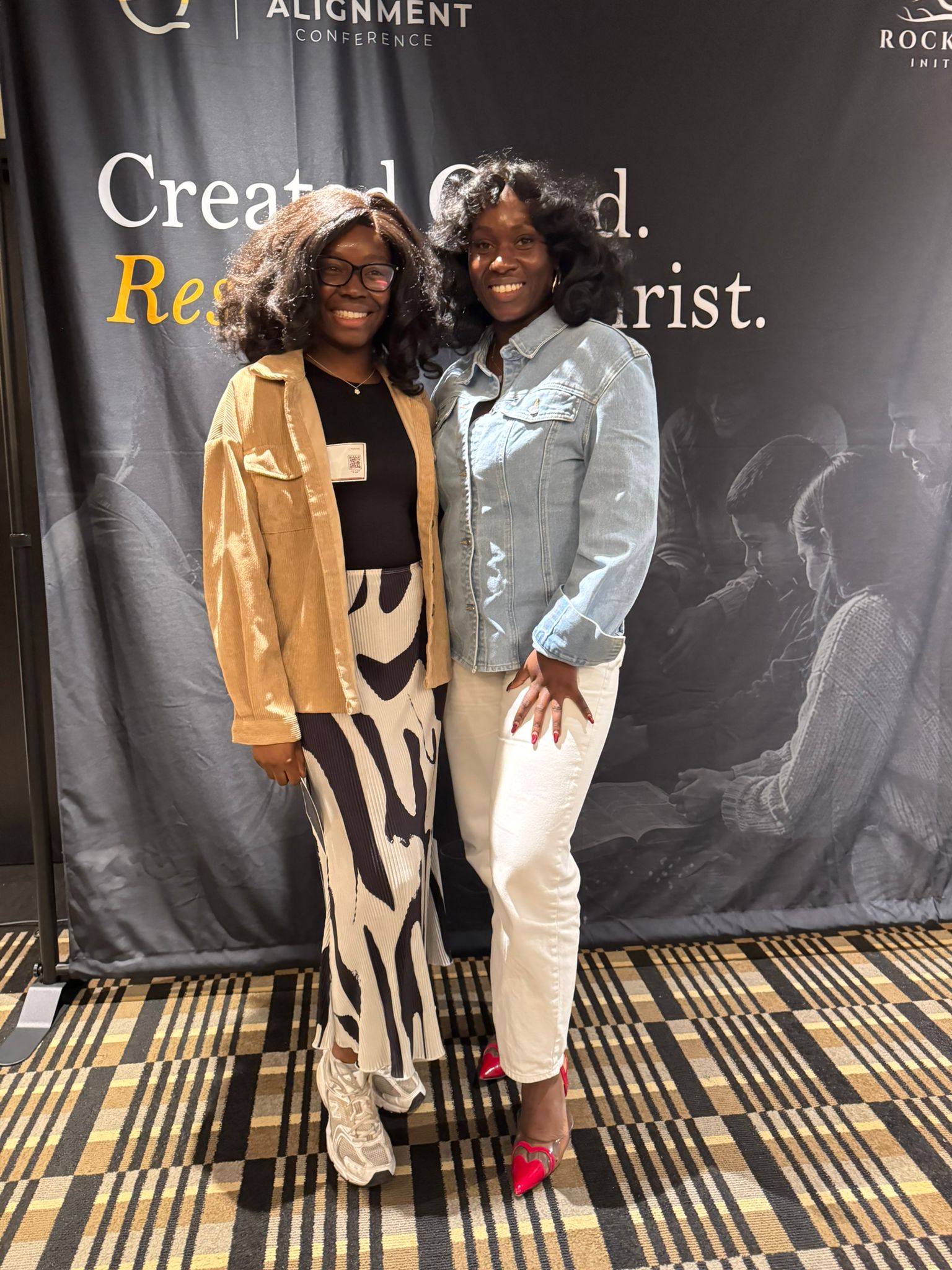 Attendees smiling during networking