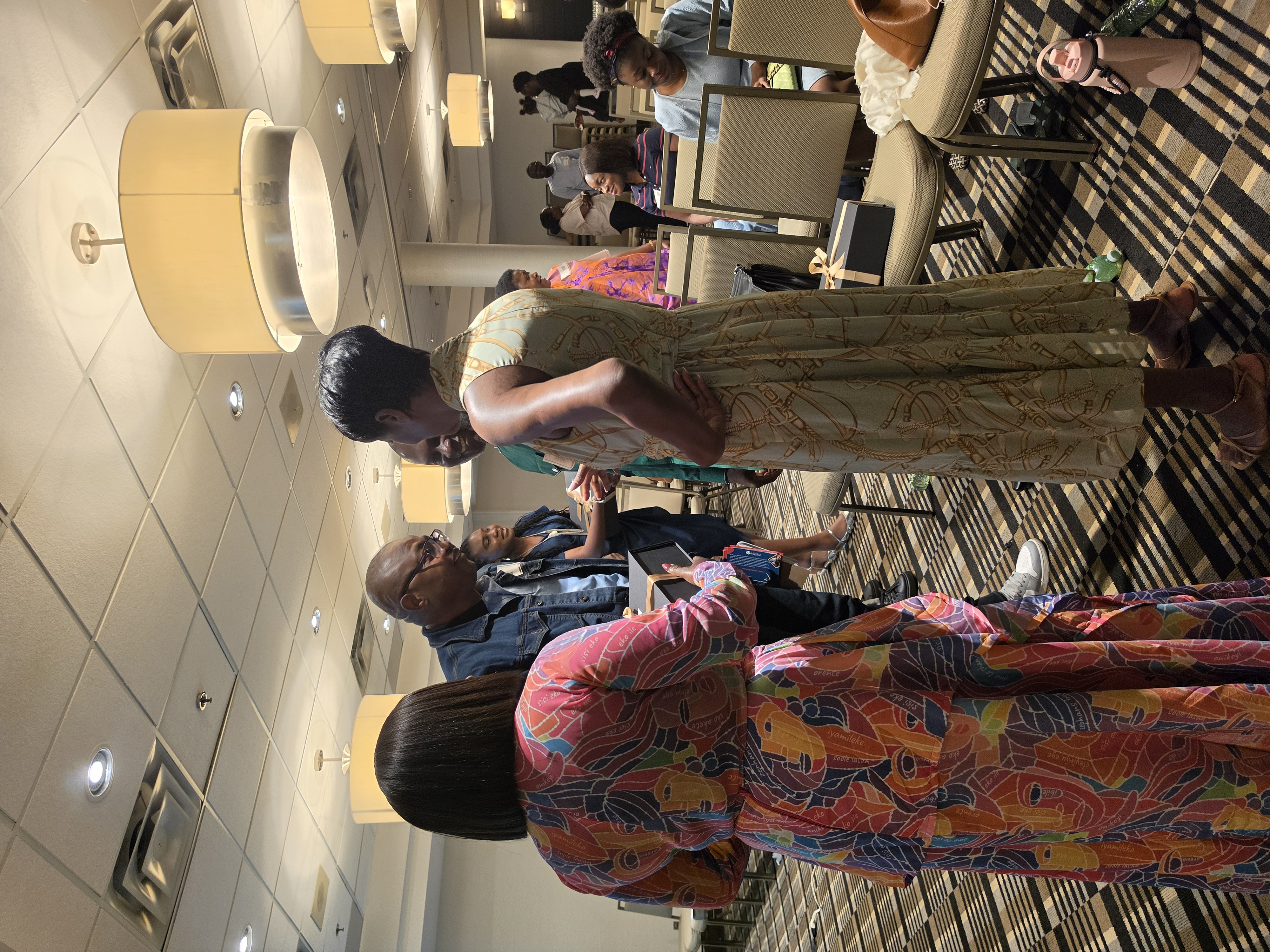 Attendees networking during the conference